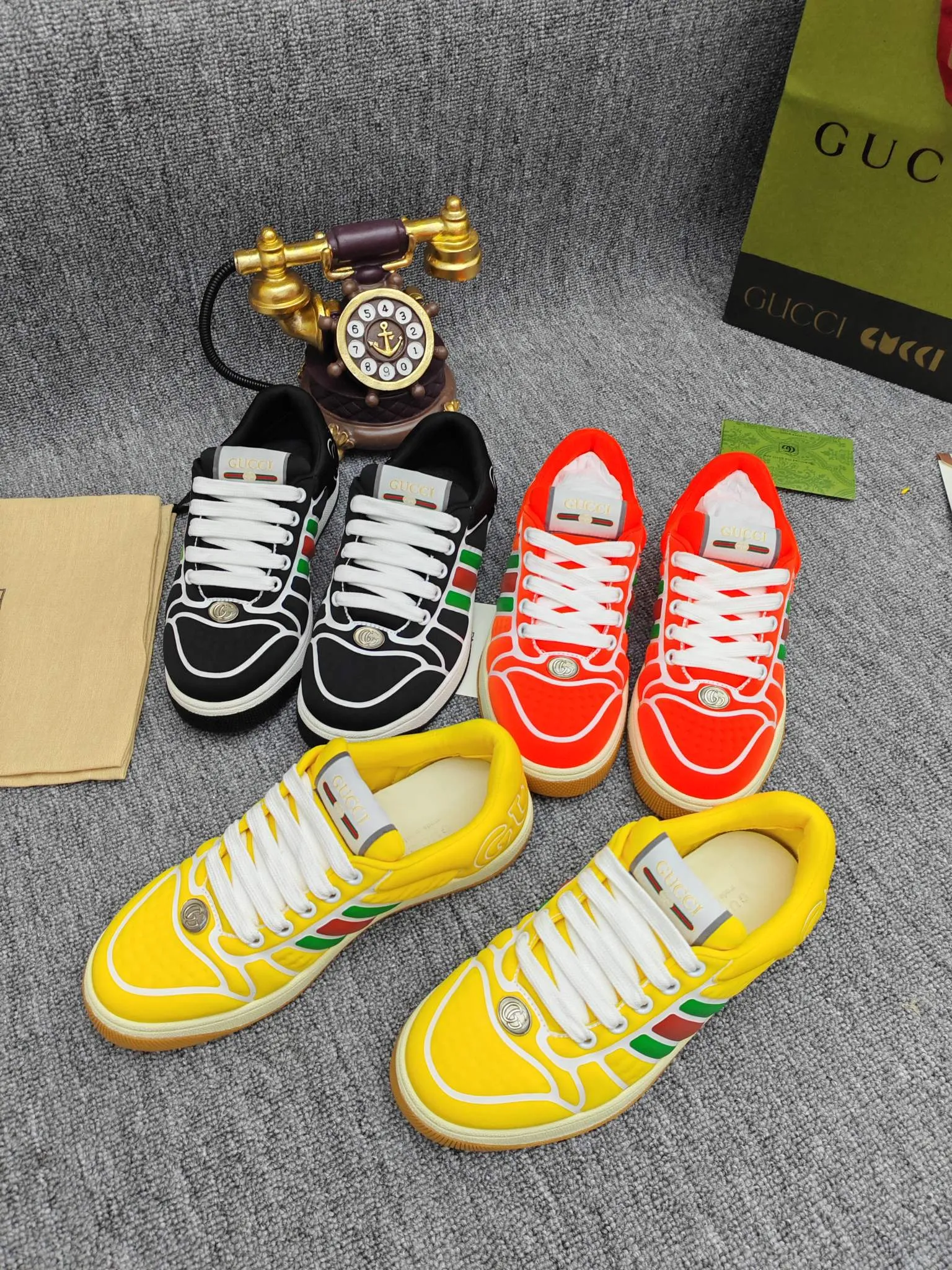Factory price 600💰Screener series embellished web sneakers. This item is from the Gucci Lido series. Its design is inspired by the summer style and beach clubs of the Italian coast. The Screener series of sneakers draws inspiration from classic sneakers from the 1970s and takes its name from a special defensive move in sports. This shoe from the 2024 Pre-Fall collection is crafted from yellow rubber, a technical and malleable opaque material, with striped webbing on the sides and an embossed Gucci printed logo on the heel. Yellow rubber, opaque and technological in appearance. Red and green webbing decorated with metal Double G oval enamel details. Gucci printed embossed logo. Women 35-40, men 38-45, (men 38 and 45 need to be customized)